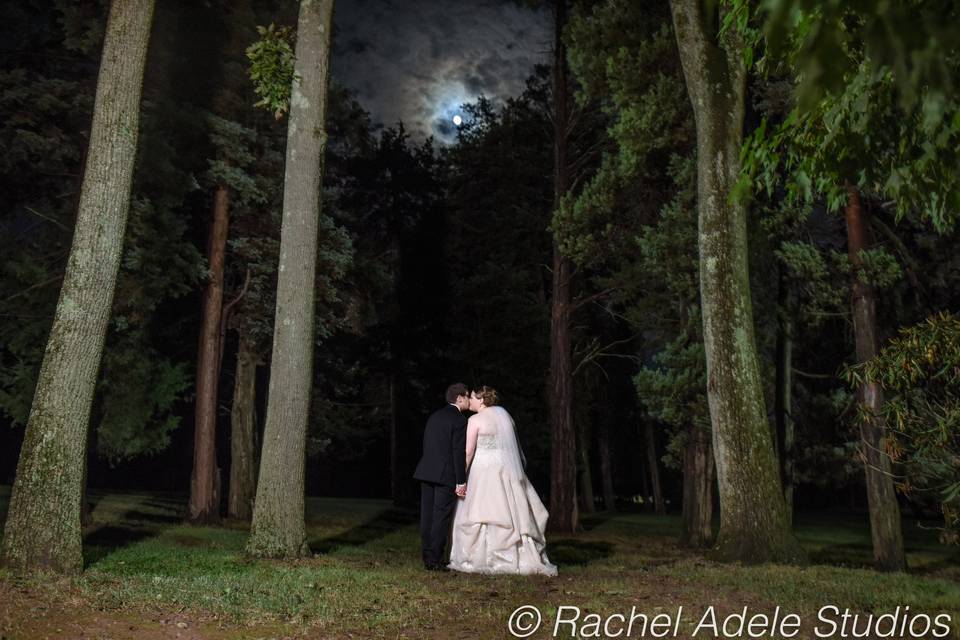 Couple in woods at night