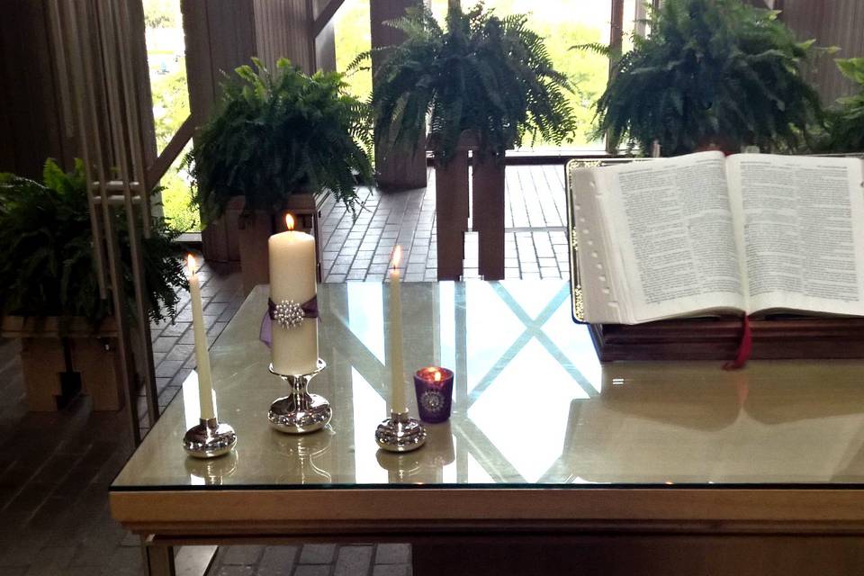 Unity candles and Bible.