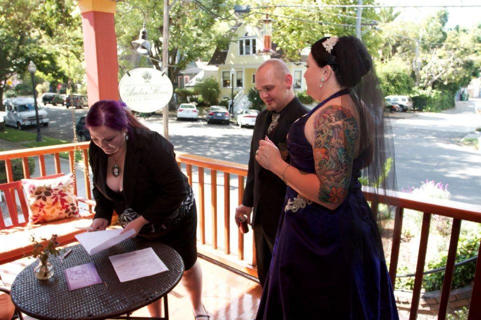 Signing documents on the porch