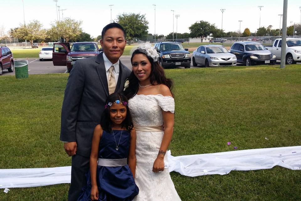 Couple with their flower girl
