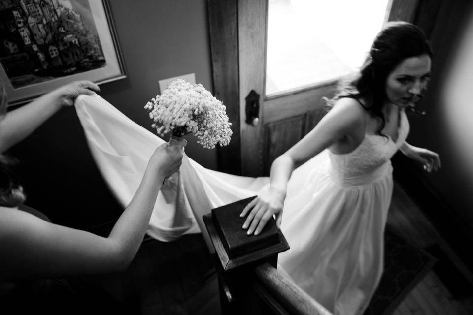 Bride descending stairs.