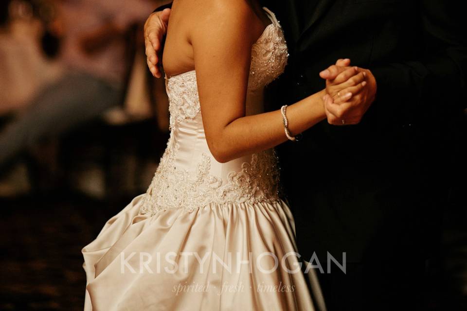 The bride dancing with her father