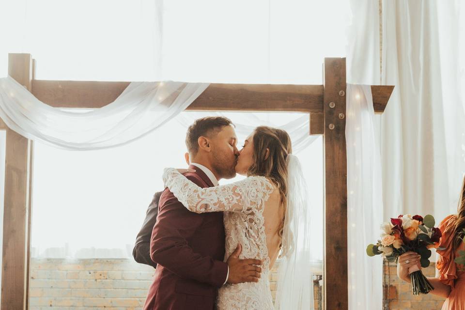 Bride and groom kissing