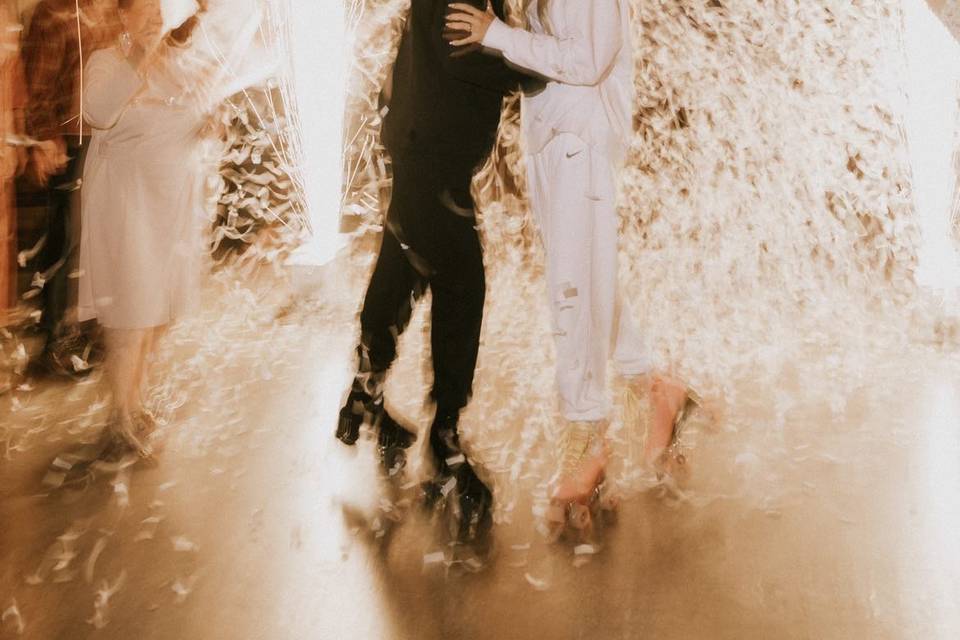 Couple kissing with fireworks