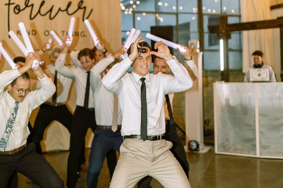 Groom dancing with his boys