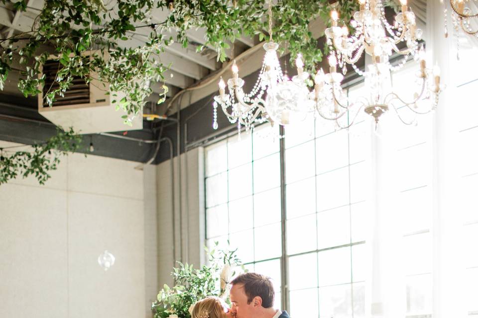 Bride and groom kissing