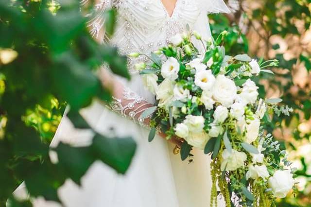 Holding white flowers