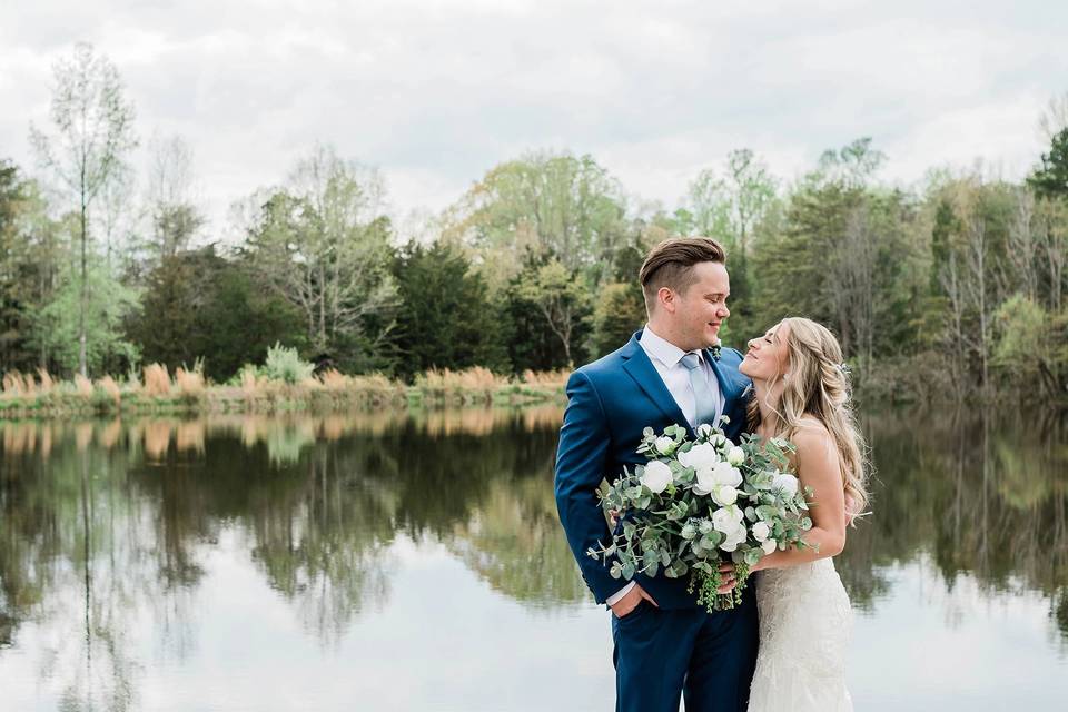 Happy couple by the water