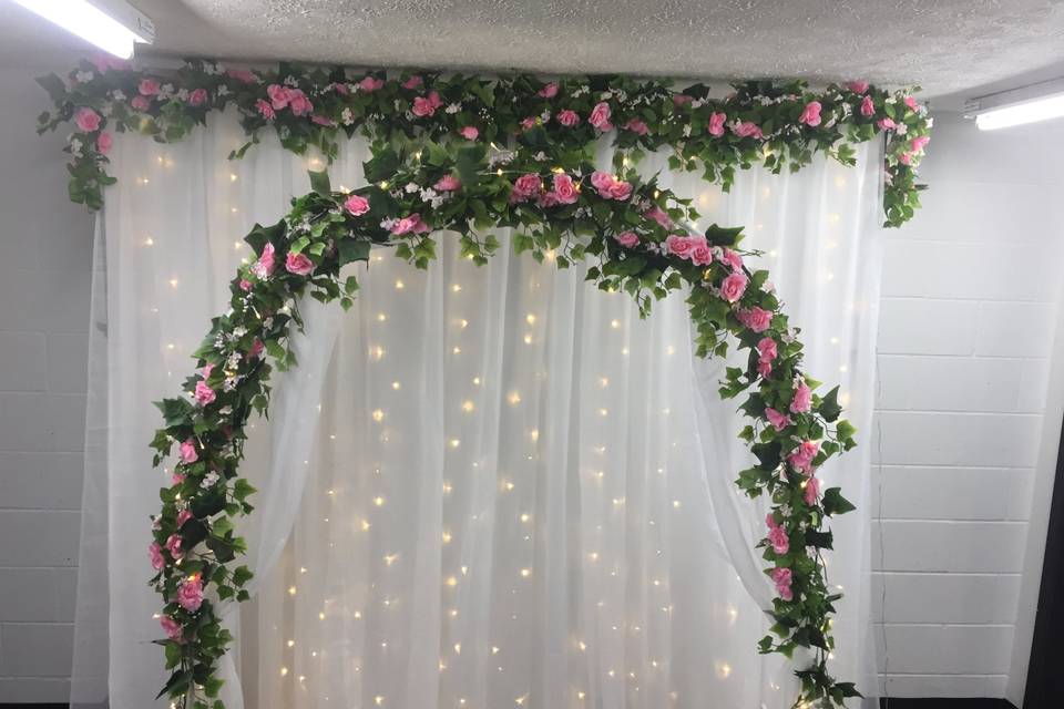 Pink flower backdrop and arch