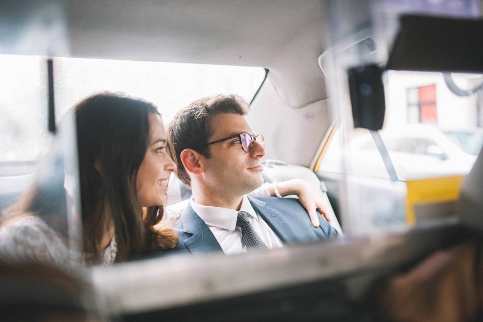 Couple sitting in a cab