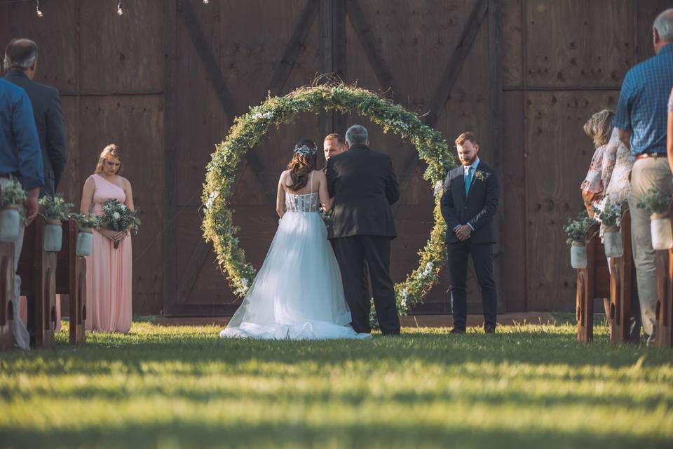 Circular floral wedding arch