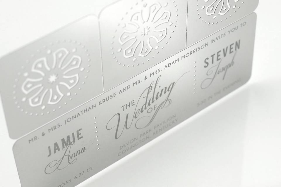 The MANTRA metal invitation sets the mood for a festive and exotic celebration. Mails flat and is folded into a sculpture by guests. Folding the invitation at the perforations will create a 3-sided box. A tea light inside will set the design aglow, sparking memories of a spectacular day for years to come. MANTRA is also available as a favor with slits into which an escort card can be inserted.