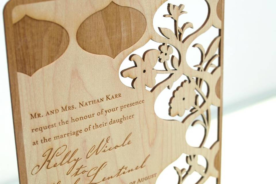 TRELLIS invitations and response cards are laser cut and engraved into reclaimed, hand-finished, 1/16” thick wood planks. Species of wood vary depending on what is available to reclaim, but all are light in color in order to showcase the beauty of the engraving. Some examples of species that might be used include maple, birch and sycamore. Each design features engraved lettering that is customizable for your event. All invitations are designed and manufactured in the USA, and using reclaimed wood makes them environmentally friendly.