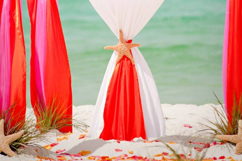 Barefoot Weddings offers a variety of colored sheers for the bamboo arbors