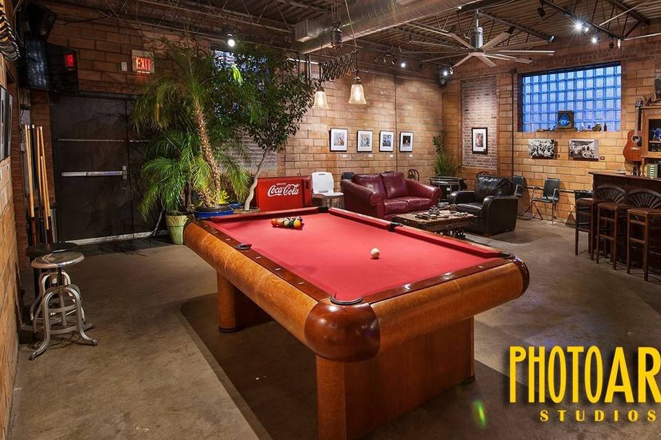 The 1930's Billiards Table with its red felt and leather sides adds a touch class.