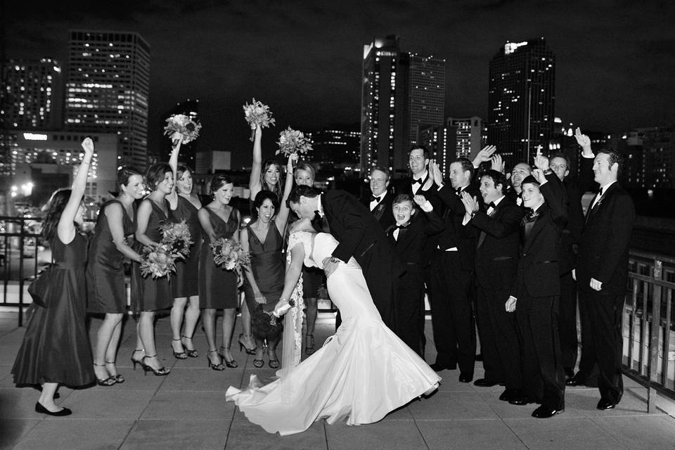 The couple with the bridesmaids and groomsmen