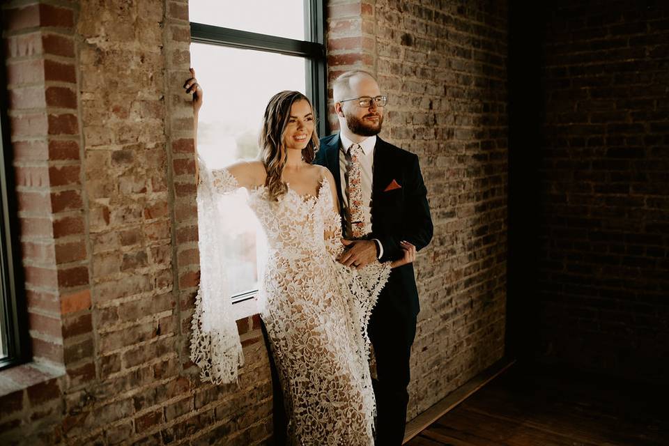 Bride & groom in upstairs hall