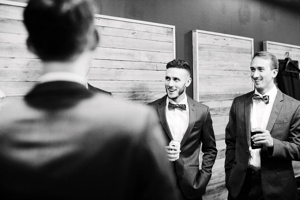 Groomsmen enjoying a drink