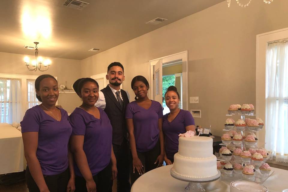 Crew posing with wedding party