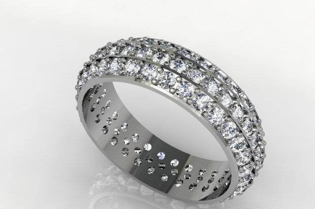 An eternity ring of three rows of diamonds. It can be made with all rounds or all princess cuts. Or, we can make it for you with a center row of princess and outer rows of round.  It can even have other colors of diamonds or other gemstones such as sapphires if you prefer.