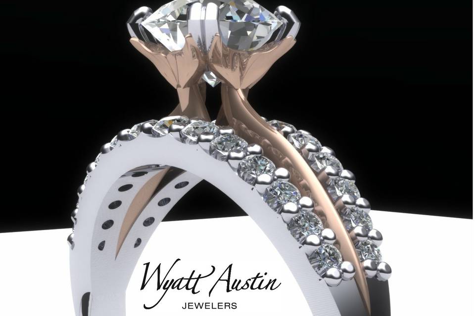A one-of-a-kind custom engagement ring. Look closely at the prongs. You can see dolphin tails holding the center diamond in place. It can be made white gold or add another metal color for the dolphin section.