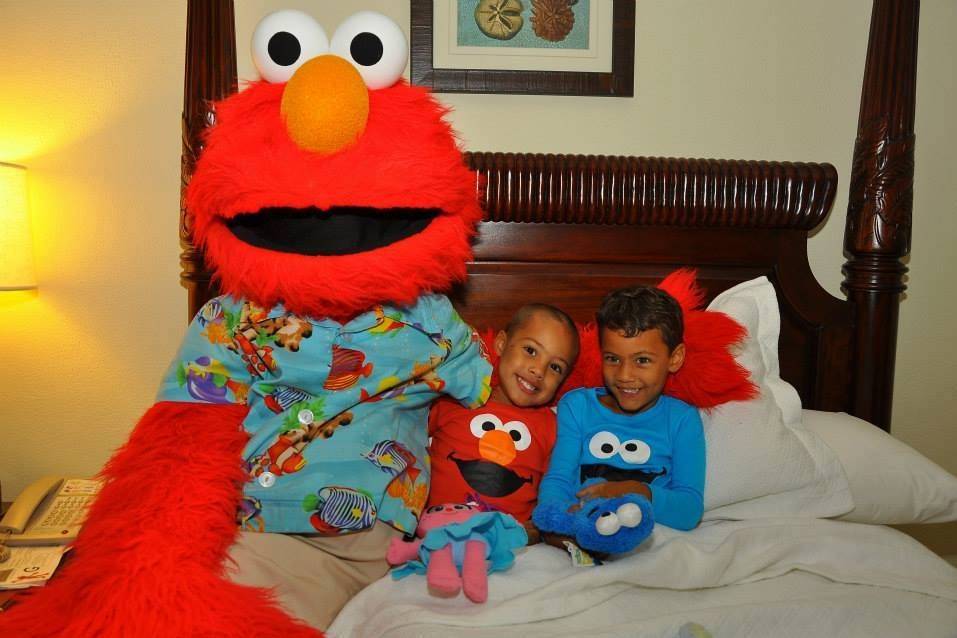 Elmo tucking in two of our adorable clients at Beaches Negril! :)