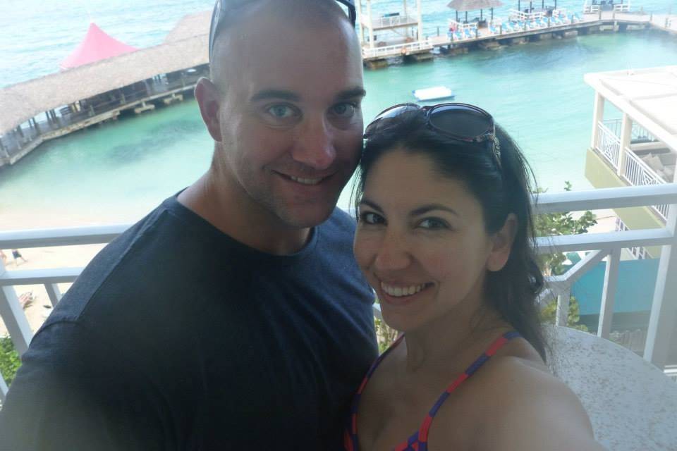 Our clients Brian & Angie enjoying their surprise upgrade to a beachfront suite at Sandals Grande Riviera!