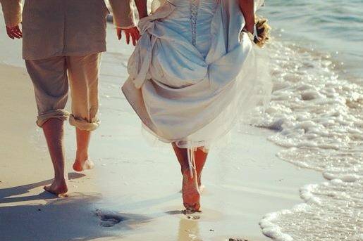 Our Weddingmoon clients Shane & Darlene taking their first steps as husband & wife after marrying in front of their families at Beaches Turks & Caicos. Photo courtesy: SnapShots photography department at Beaches Turks & Caicos.