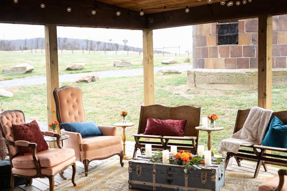 Seating area under porch.