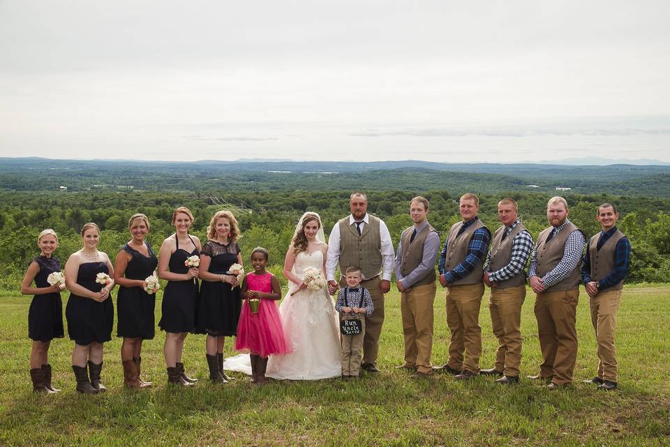 The couple with the bridesmaids and groomsmen