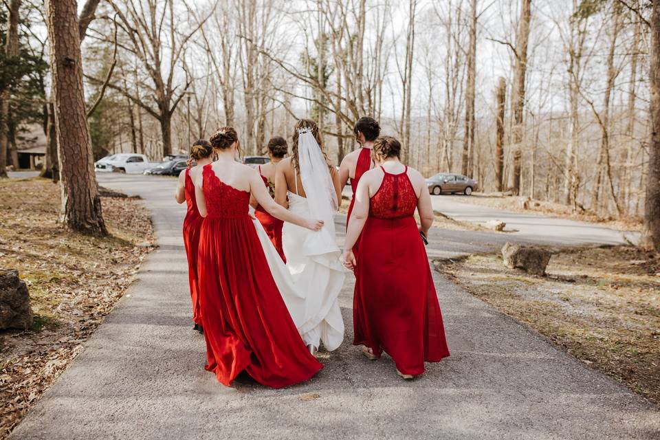 Girls walking their friend