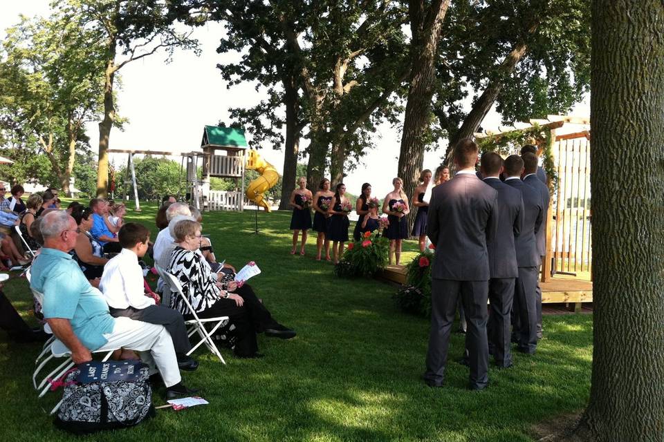 The men serenade the bride