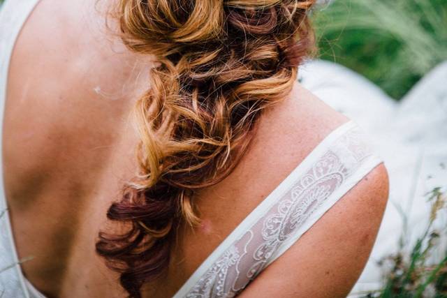 Braided wedding hair with accessory
