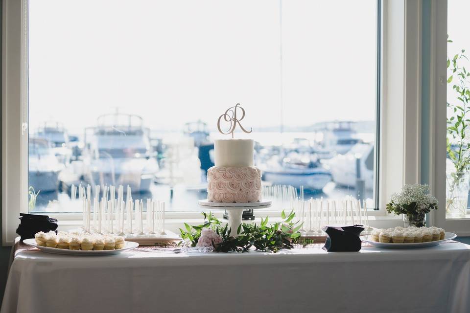 A romantic wedding cake and desserts to share