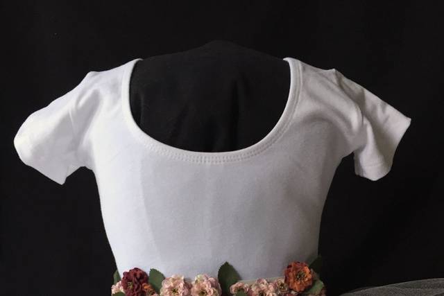 Blush skirt made with oodles and oodles of tulle. The sash is made of either a lace or ivory ribbon which ties in the back.  A lined white cotton leotard is included.
0-24 Months         $65
2t-5t                    $75
6-9                      $95
10-14                  $105