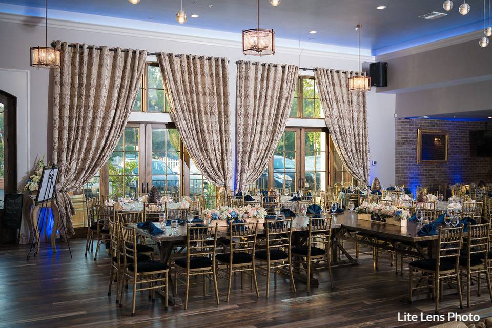 Main ballroom with farm house tables