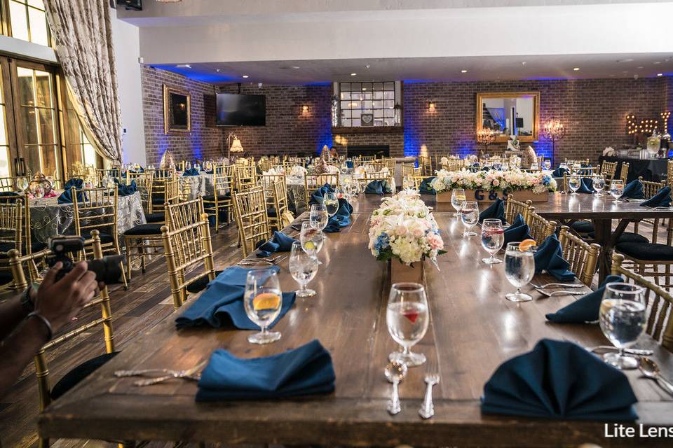 Main ballroom with farm house tables