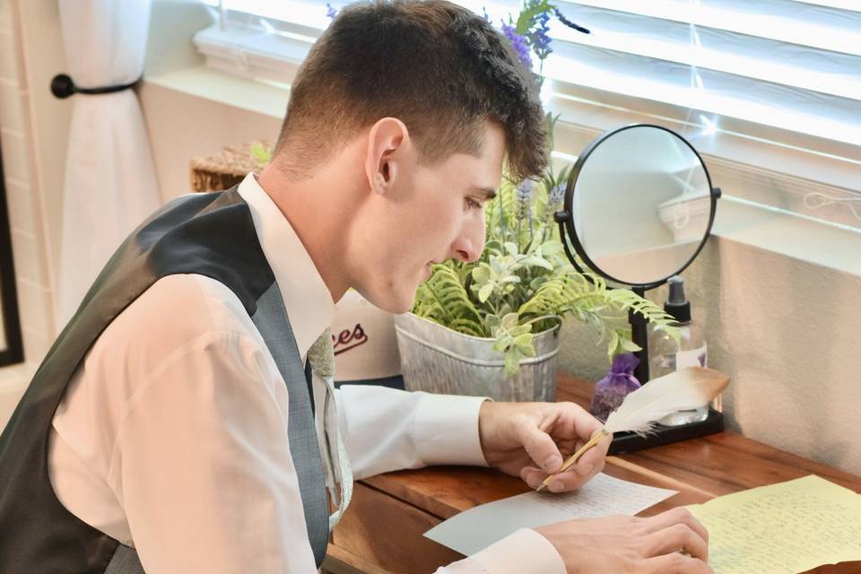 The Groom writing his vows