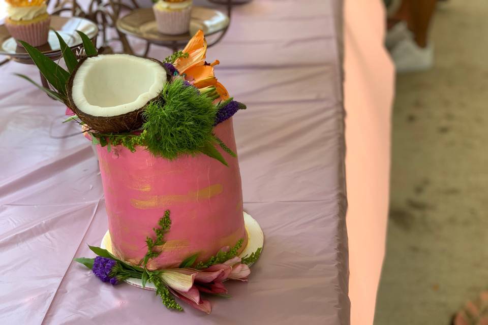 Pink icing and coconut decoration