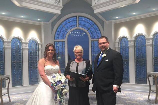 Bride, groom, and officiant