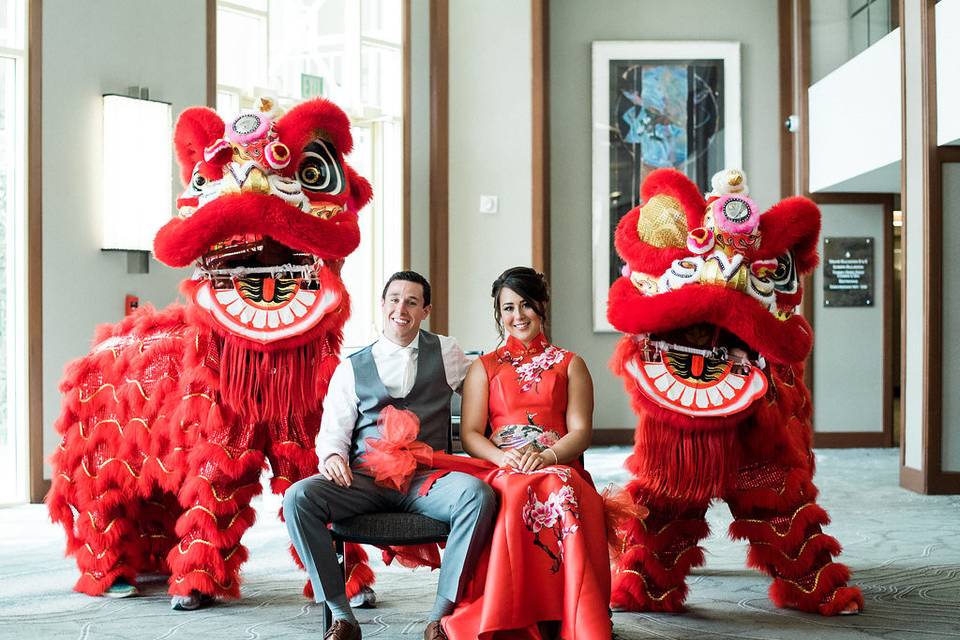 Newlyweds with the lion dancers | Photo Credit: whisker & willow photography
