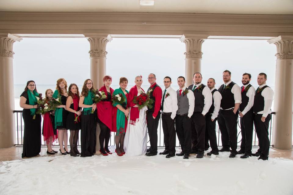 The couple with the bridesmaids and groomsmen