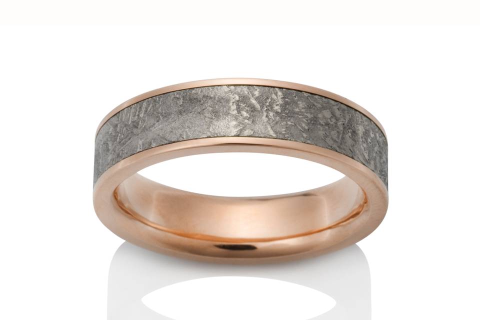 Limited Edition antique Damascus shotgun barrel ring with 18K yellow gold.