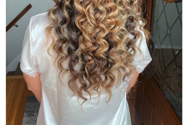 Curly half updo