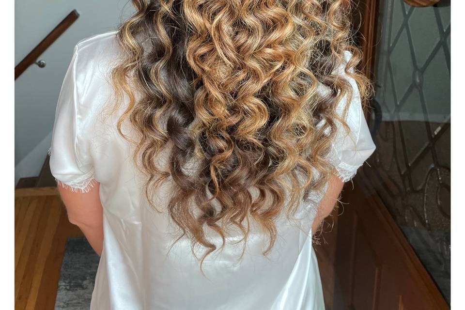 Curly half updo