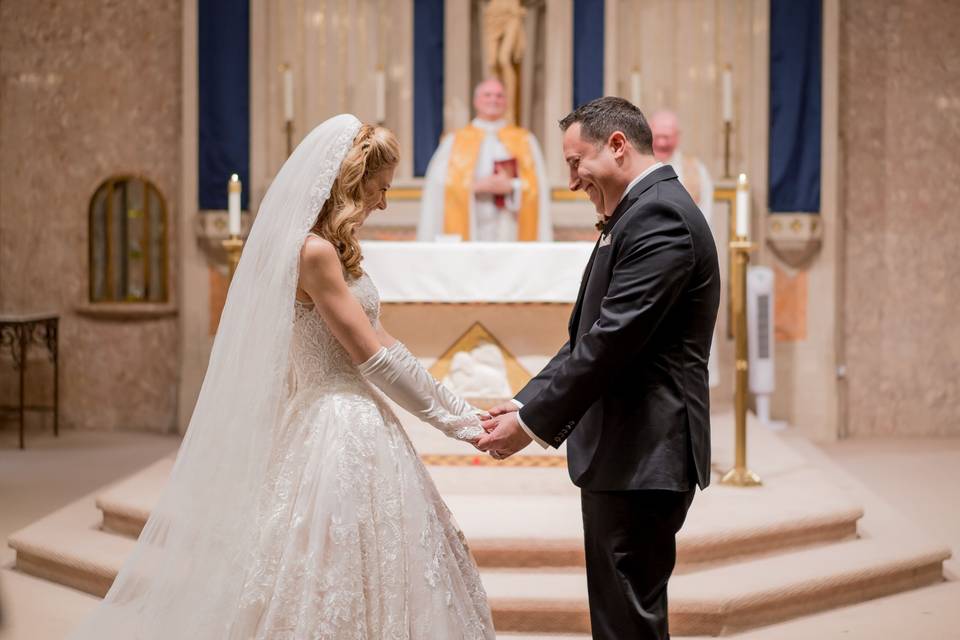 Happy couple holding hands - Alexander Rivero