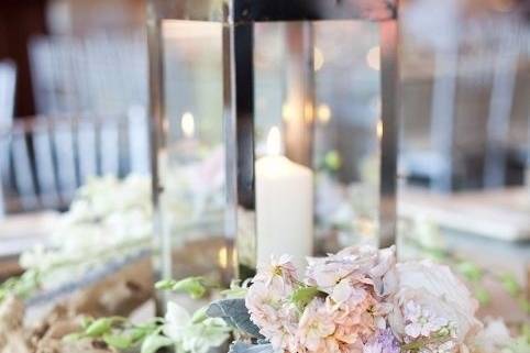 Lantern, florals, and driftwood