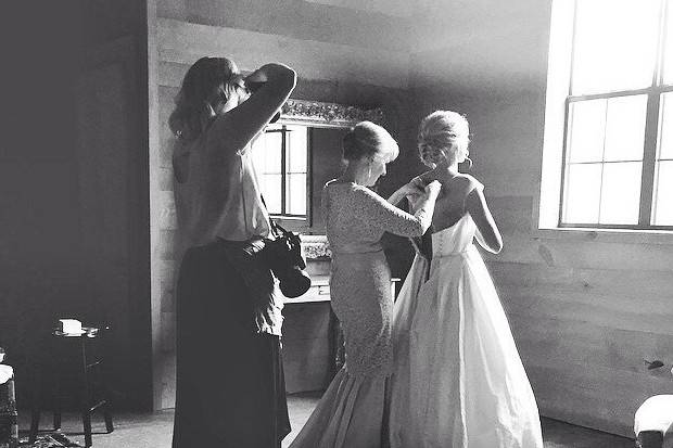 Bride fitting her gown