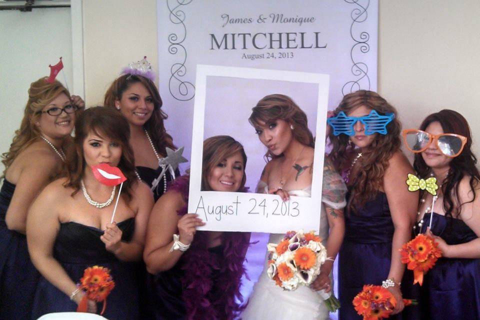 Bride and bridesmaids with props