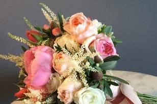 Spring bridal bouquet with peonies.